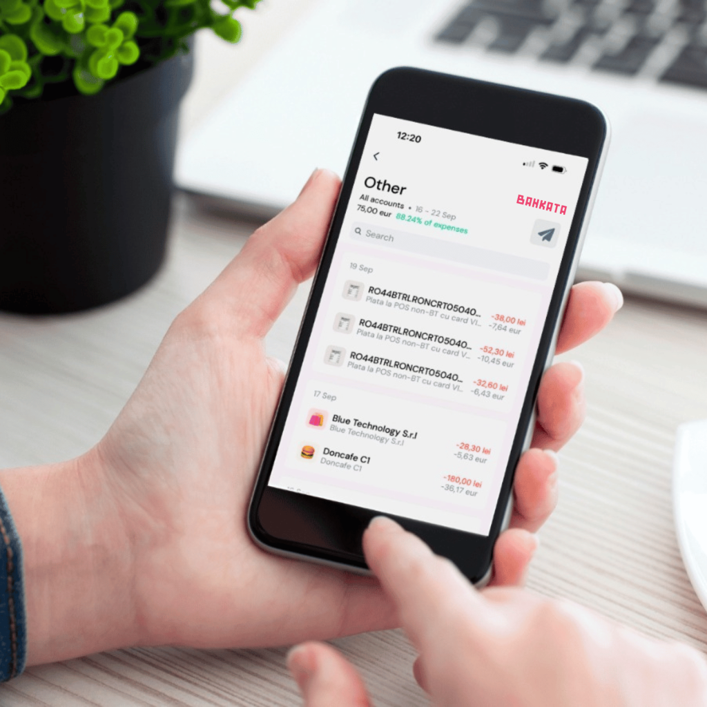 Phone in hand with bankata app